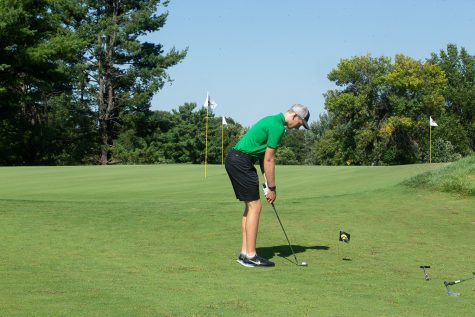 Junior Ronan Kleu lines up for a shot during an Iowa Men’s Golf Practice at Hoak Family Golf Complex in Iowa City on Thursday Sept. 16, 2021. 