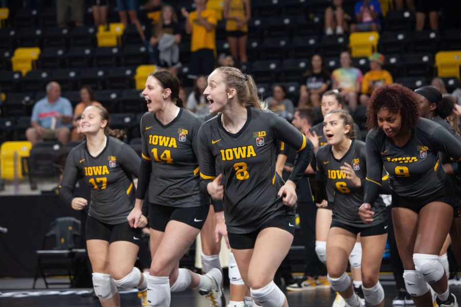 Iowa+volleyball+players+run+onto+the+court+to+celebrate+their+first+win+of+the+season+as+Iowa+defeated+Iowa+State+3-0+at+Xtream+arena+in+Coralville+on+September+11+2021.