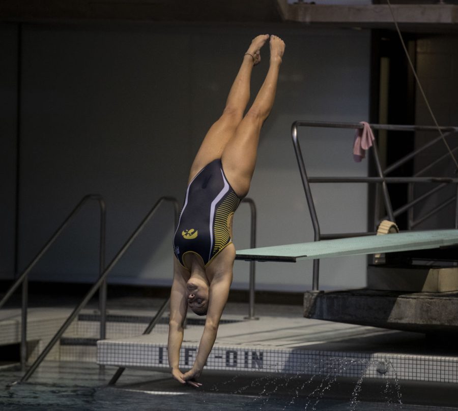 Iowa diver Sarah Ballard competes in the 1 meter diving during a swim meet between Iowa and Minnesota at the Campus Recreation and Wellness Center on Friday Oct. 8, 2021. The Gophers defeated The Hawkeyes 156-104.