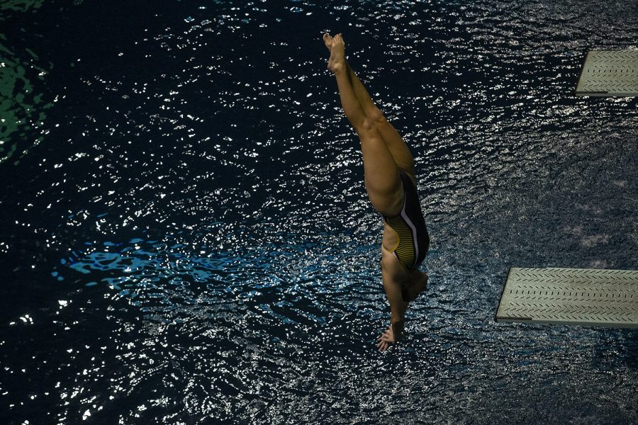 An Iowa diver competes during a meet against the University of Northern Iowa at the Campus Recreation and Wellness Center on Friday, Oct. 1, 2021. The Panthers defeated the Hawkeyes 159-133.