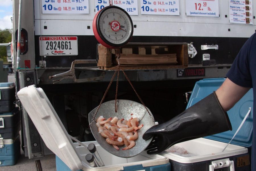 Fabian seafood set up a stand in the Iowa City Dairy Queen parking lot to start their tour of the Midwest selling seafood. Jeremy Chamberlain said the family travels once every four weeks cycling from April to November to sell wild caught seafood on Monday, Oct. 4, 2021.