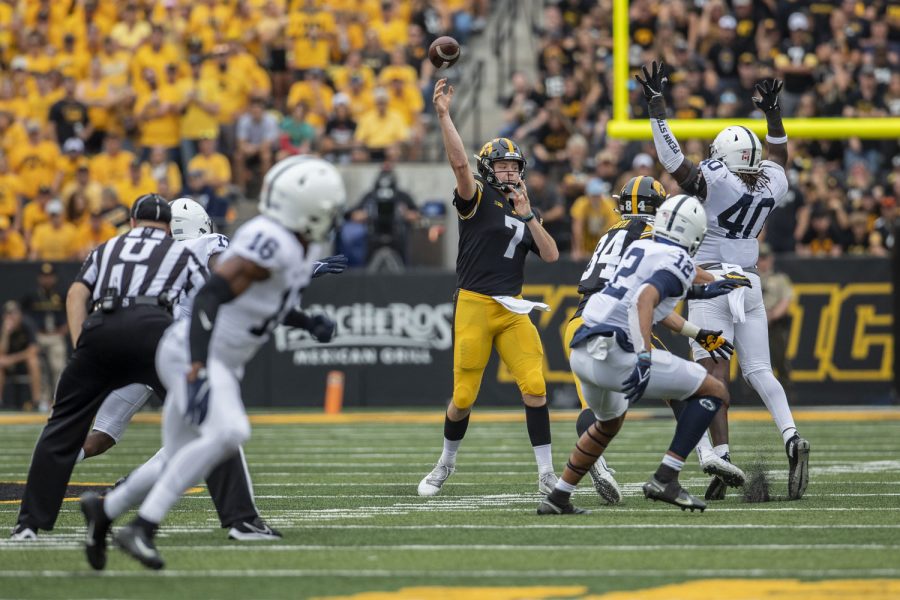Iowa quarterback Spencer Petras passes the ball during a football game between No. 3 Iowa and No. 4 Penn State at Kinnick Stadium on Saturday, Oct. 9, 2021. The Hawkeyes defeated the Nittany Lions 23-20. (Grace Smith/The Daily Iowan)