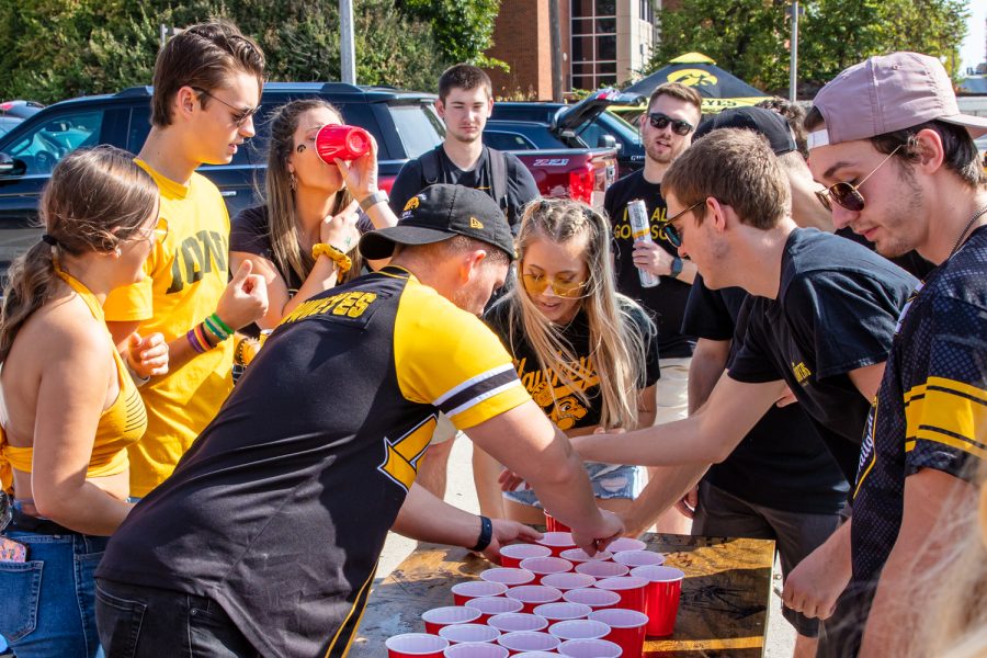 Iowa Hawkeye fan set up a drinking game while tailgating before a football game between Iowa and Penn State at the Library Lot on Saturday, Oct. 9, 2021. 