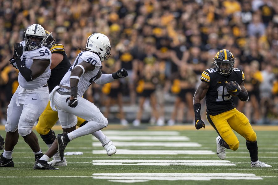 Iowa running back Tyler Goodson finds a hole during a football game between No. 3 Iowa and No. 4 Penn State at Kinnick Stadium on Saturday, Oct. 9, 2021. The Hawkeyes defeated the Nittany Lions 23-20. (Jerod Ringwald/The Daily Iowan)