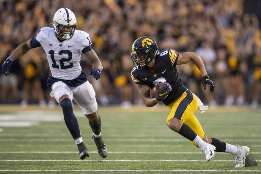 Iowa wide receiver Keagan Johnson makes a move after a reception during a football game between No. 3 Iowa and No. 4 Penn State at Kinnick Stadium on Saturday, Oct. 9, 2021. The Hawkeyes defeated the Nittany Lions 23-20. (Jerod Ringwald/The Daily Iowan)