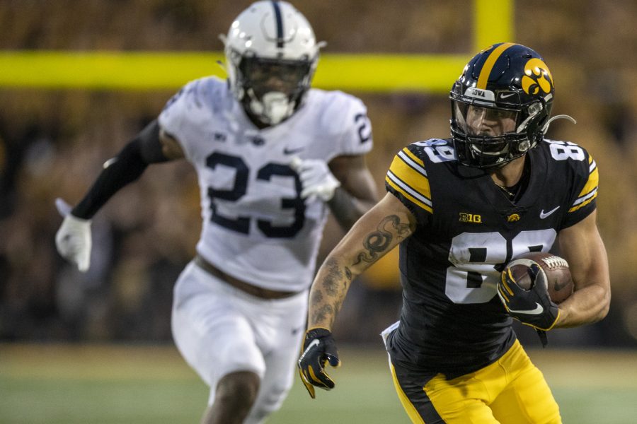 Iowa+wide+receiver+Nico+Ragaini+runs+downfield+after+catching+a+pass+during+a+football+game+between+No.+3+Iowa+and+No.+4+Penn+State+at+Kinnick+Stadium+on+Saturday%2C+Oct.+9%2C+2021.+The+Hawkeyes+defeated+the+Nittany+Lions+23-20.+%28Jerod+Ringwald%2FThe+Daily+Iowan%29