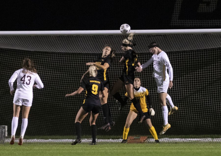 University of Iowa forward Alyssa Walker hits a header to help defend their goal during a soccer game between Iowa and Minnesota at the UI Soccer Complex on Thursday Oct. 21, 2021. The Hawkeyes defeated the Gophers 1-0. 