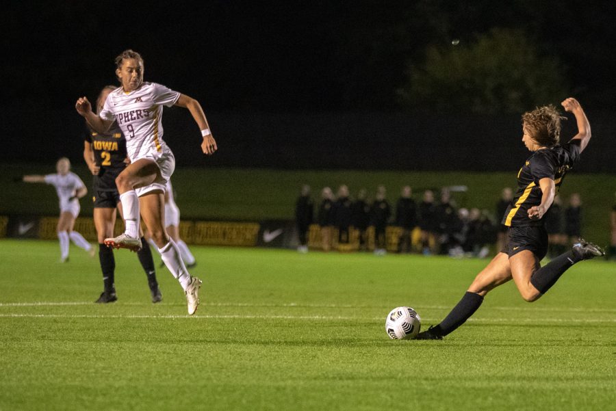 Iowa defender Riley Whitaker clears the ball during a soccer game between Iowa and Minnesota at the UI Soccer Complex in Iowa City on Thursday, Oct. 21, 2021.The Hawkeyes defeated the Gophers 1-0. 