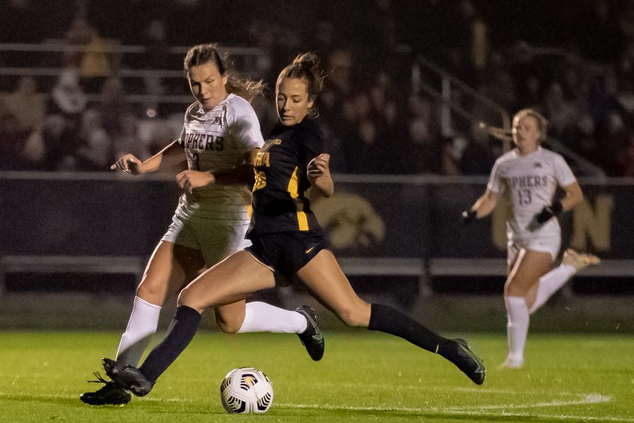 Iowa midfielder Kenzie Roling shoots and scores during a soccer game between Iowa and Minnesota at the UI Soccer Complex in Iowa City on Thursday, Oct. 21, 2021.The Hawkeyes defeated the Gophers 1-0. 