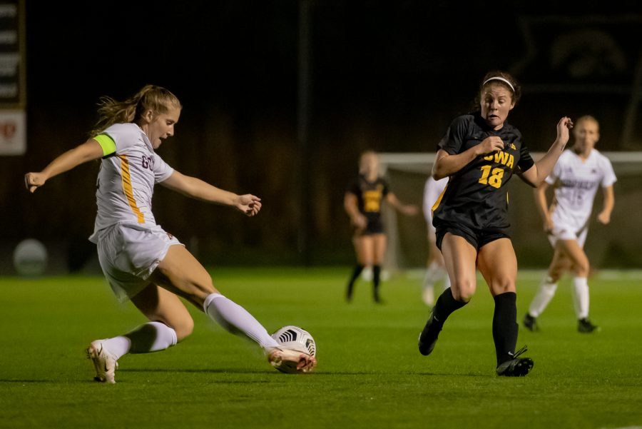 A Minnesota defender clears the ball during a soccer game between Iowa and Minnesota at the UI Soccer Complex in Iowa City on Thursday, Oct. 21, 2021.The Hawkeyes defeated the Gophers 1-0. 