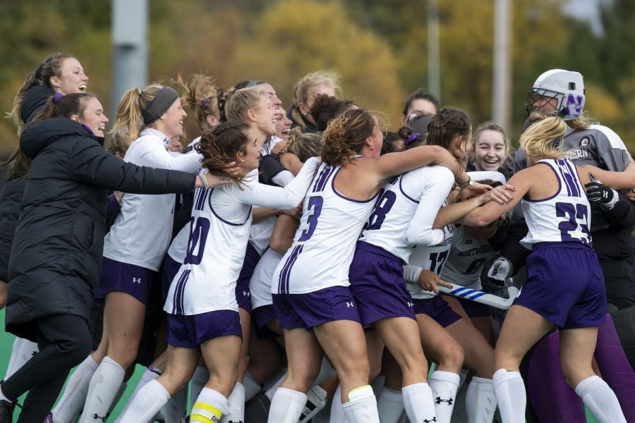 Northwestern celebrates a win at a field hockey game between Iowa and Northwestern at Grant Field on Oct. 29, 2021. The Wildcats defeated the Hawkeyes 2-1.