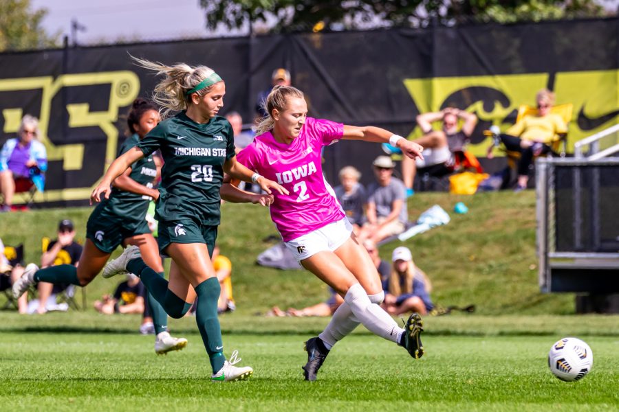 Iowa+midfielder+Hailey+Rydberg+passes+the+ball+during+a+soccer+game+between+Iowa+and+Michigan+State+at+the+Iowa+Soccer+Complex+on+Sunday%2C+Oct.+3%2C+2021.+Michigan+State+defeated+Iowa%2C+2-1.+