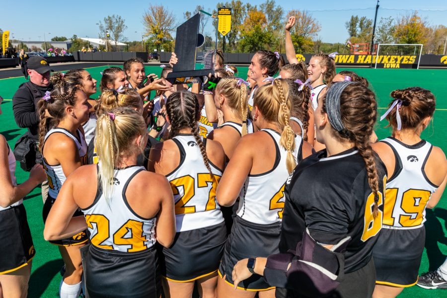 The Iowa Hawkeyes celebrate clinching a share of the Big Ten Conference regular season title during the field hockey game between Iowa and Ohio State at Grant Field on Sunday, Oct. 17, 2021. Iowa defeated Ohio State 3-0. 
