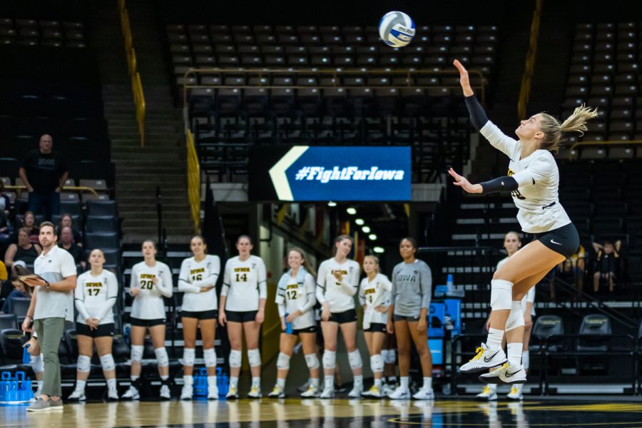 Iowa defensive specialist/libero Mari Hinkle serves the ball during a volleyball game between Iowa and Michigan at Carver-Hawkeye Arena on Saturday, Oct. 2, 2021. Michigan defeated Iowa 3-0. 