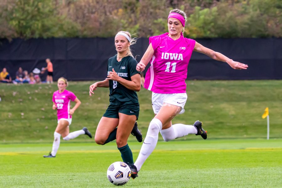 Iowa forward Alyssa Walker goes to kick the ball during a soccer game between Iowa and Michigan State at the Iowa Soccer Complex on Sunday, Oct. 3, 2021. Michigan State defeated Iowa 2-1. 
