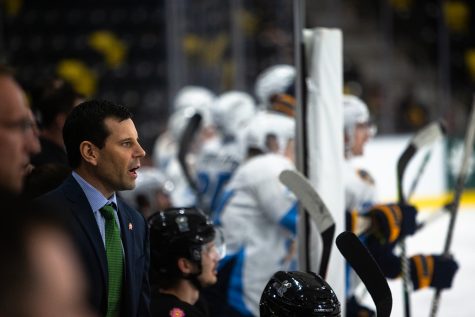 Heartlanders head coach Gerry Fleming speaks with the team during a hockey game between the Iowa Heartlanders and the Toledo Walleye at the Xtream Arena in Coralville, Iowa on Friday, Oct. 30, 2021. The Walleye won against the Heartlanders, 10-1. 