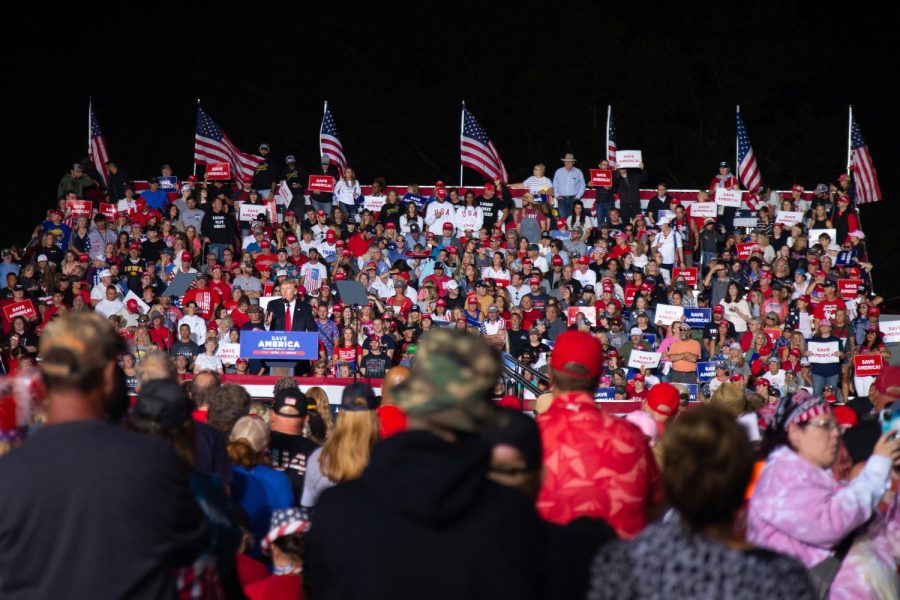 Former president Donald Trump addresses attendees during his Save America rally in Des Moines, Iowa, on Saturday, Oct. 9, 2021.