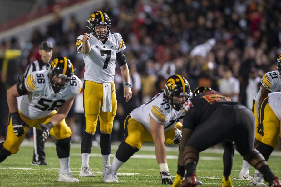 Iowa quarterback Spencer Petras gets the offense ready for play during a football game between Iowa and Maryland at Maryland Stadium on Friday, Oct. 1, 2021. Petras threw for 259 yards and three touchdowns. The Hawkeyes defeated the Terrapins 51-14.