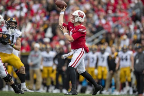 Wisconsin quarterback Graham Mertz throws a pass during a football game between No. 9 Iowa and Wisconsin at Camp Randall Stadium on Saturday, Oct. 30, 2021. Mertz threw 22 passes with a QBR rating of 77.1.The Badgers defeated the Hawkeyes 27-7. 