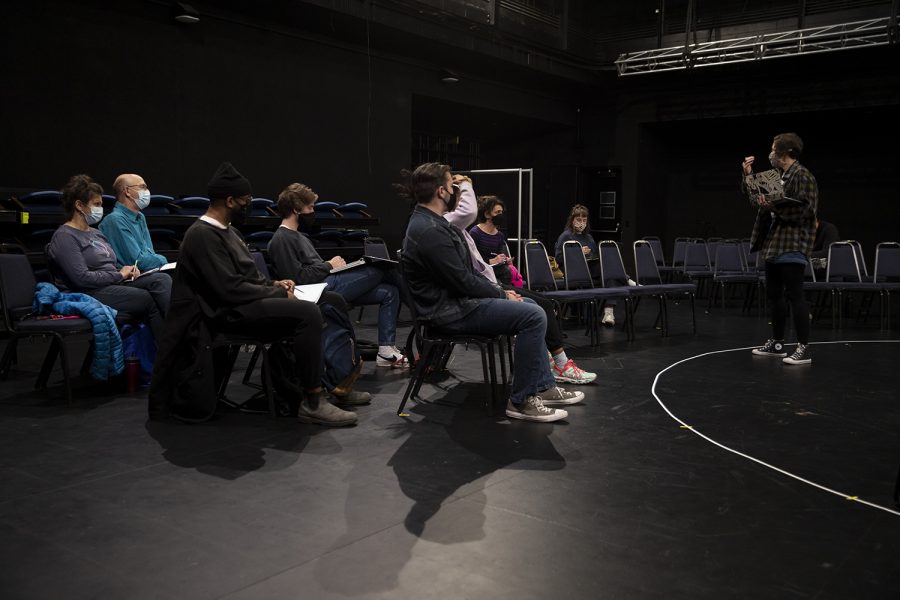 Director Sarah Gazdowicz goes over notes with the cast after a run-through of ‘HOW CAN I KEEP FROM SINGING’ at the David Thayer Theatre on Thursday, Nov. 4, 2021. The production runs Nov. 5-7. Playwright Amanda Keating wrote the setting as “tomorrow” in the script. In reference to this, Gazdowicz said, “It’s important to think about this play in our literal setting of the moment.” 