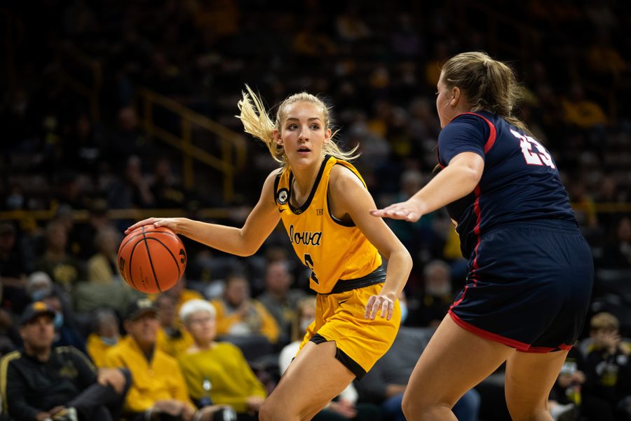 Iowa+guard+Kylie+Feuerbach+backs+down+Samford+guard+Kathleen+Wheeler+during+a+women%E2%80%99s+basketball+game+between+Iowa+and+Samford+at+Carver-Hawkeye+Arena+in+Iowa+City+on+Thursday%2C+Nov.+11%2C+2021.+Feuerbach+had+nine+total+points.The+Hawkeyes+defeated+the+Bulldogs+91-54.