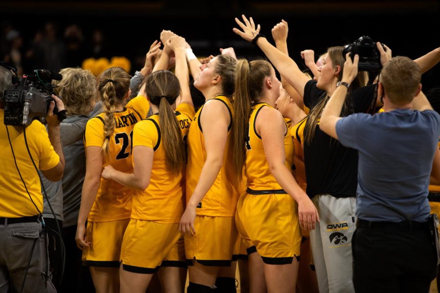 The Hawkeyes huddle up after a women’s basketball game between Iowa and Samford at Carver-Hawkeye Arena in Iowa City on Thursday, Nov. 11, 2021. The Hawkeyes defeated the Bulldogs 91-54.