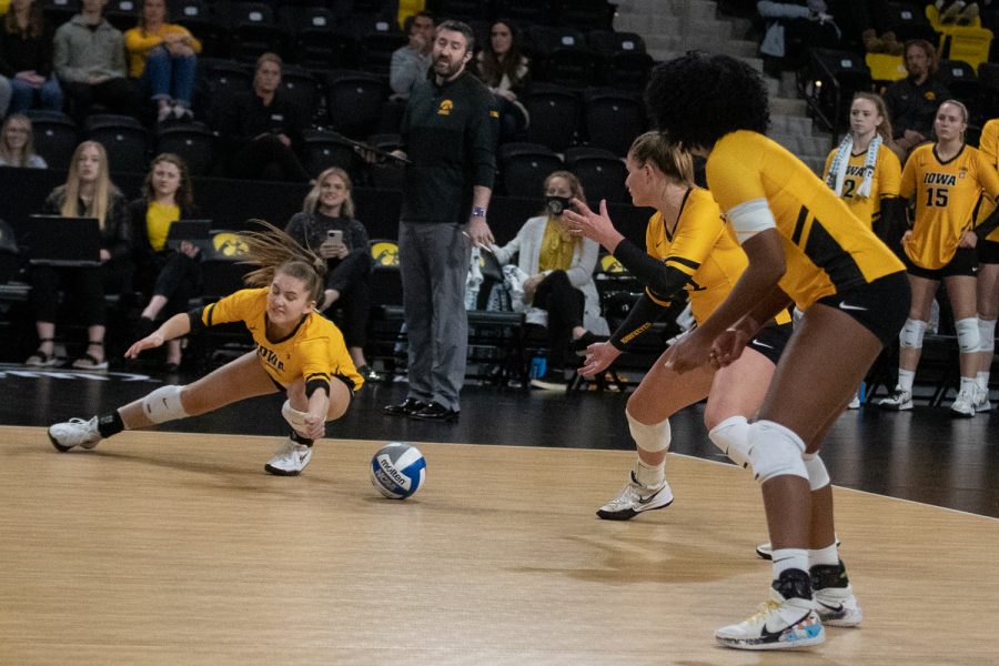 Iowa setter Jenna Splitt just misses the ball during a volleyball match between Iowa and Minnesota at Xtream Arena in Coralville on Thursday, Nov. 11, 2021. The Gophers beat the Hawkeyes 3-0.