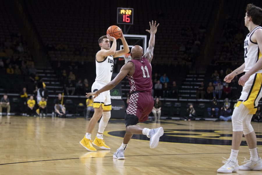 Iowa guard Jordan Bohannon releases a 3-pointer during a basketball game between Iowa and North Carolina Central at Carver-Hawkeye Arena in Iowa City on Tuesday, Nov. 16, 2021. The 3-pointer gave Bohannon a share of the Big Ten record for most 3’s made in a career. Bohannon tied former Ohio State guard Jon Diebler at 374 career makes. The Hawkeyes defeated the Eagles 86-69.