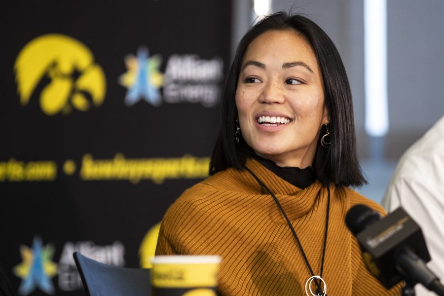 Clarissa Chun smiles while being introduced as the new women’s wrestling coach for the University of Iowa during a press conference at Carver-Hawkeye Arena in Iowa City on Friday, Nov. 19, 2021. Chun won an Olympic bronze medal for Team USA in the 2012 Olympics.