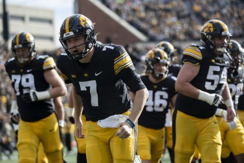 Iowa quarterback Spencer Petras cheers before a football game between No. 17 Iowa and Illinois at Kinnick Stadium in Iowa City on Saturday, Nov. 20, 2021. The Hawkeyes defeated the Fighting Illini 33-23 at the last home game of the season. 