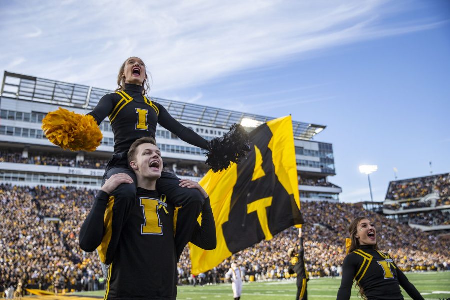 Iowa cheerleaders perform during a football game between No. 17 Iowa and Illinois at Kinnick Stadium on Saturday, Nov. 20, 2021. The Hawkeyes defeated the Fighting Illini 33-23 at the last Iowa home game of the season. 