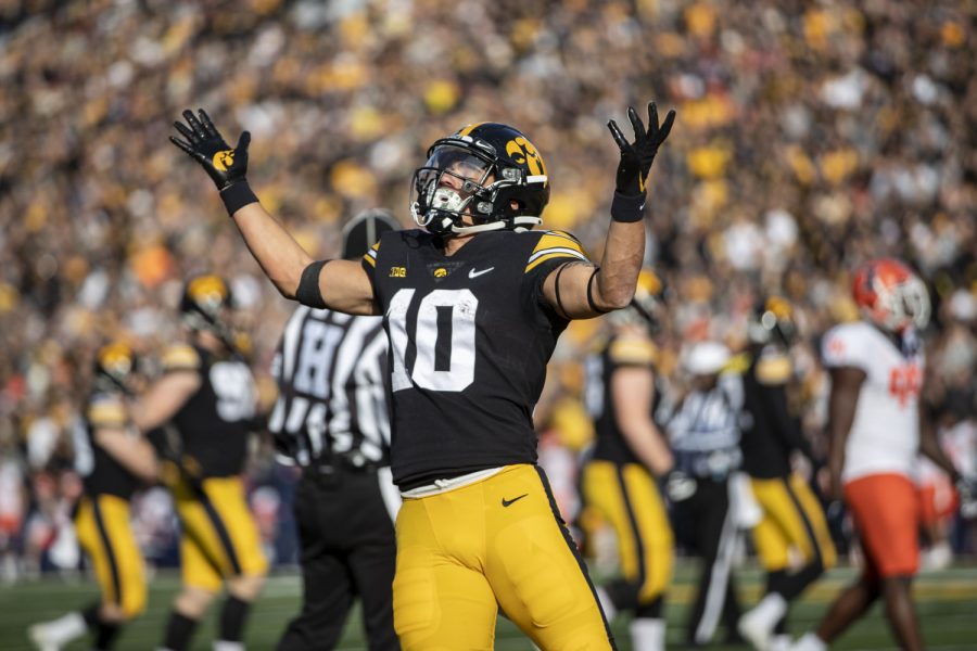 Iowa wide receiver Arland Bruce IV celebrates a touchdown during a football game between No. 17 Iowa and Illinois at Kinnick Stadium in Iowa City on Saturday, Nov. 20, 2021. Bruce had two receptions on the day for 45 yards. The Hawkeyes defeated the Fighting Illini 33-23 at the last home game of the season. 