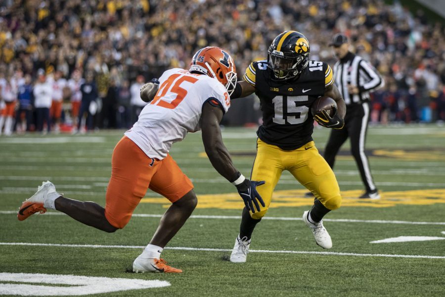 Iowa running back Tyler Goodson carries the ball during a football game between No. 17 Iowa and Illinois at Kinnick Stadium in Iowa City on Saturday, Nov. 20, 2021. The Hawkeyes defeated the Illini 33-23 at the last home game of the season. (Grace Smith/The Daily Iowan)