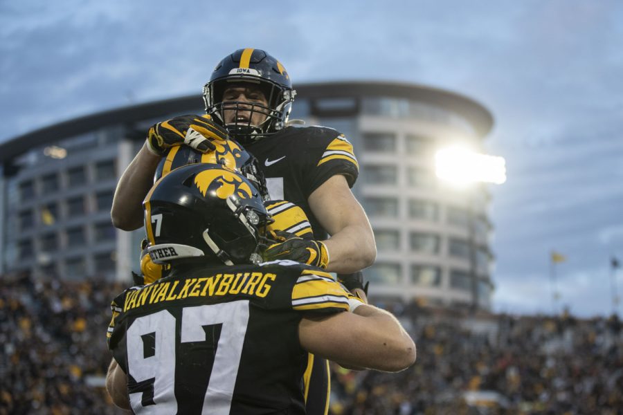 Iowa+players+celebrate+linebacker+Jack+Campbell%E2%80%99s+interception+and+touchdown+during+a+football+game+between+No.+17+Iowa+and+Illinois+at+Kinnick+Stadium+in+Iowa+City+on+Saturday%2C+Nov.+20%2C+2021.+The+Hawkeyes+defeated+the+Illini+33-23+at+the+last+home+game+of+the+season.