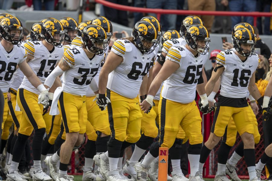 The+Iowa+Hawkeyes+take+the+field+during+a+football+game+between+No.+16+Iowa+and+Nebraska+at+Memorial+Stadium+in+Lincoln%2C+Nebraska%2C+on+Friday%2C+Nov.+26%2C+2021.+The+Hawkeyes+defeated+the+Cornhuskers+28-21.