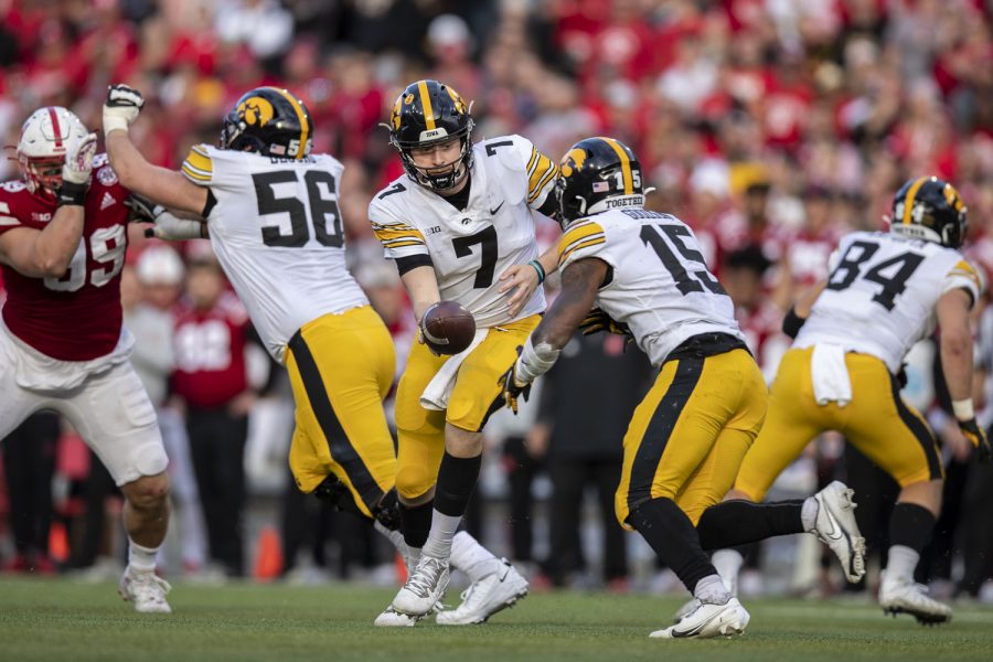 Iowa+quarterback+Spencer+Petras+hands+the+ball+off+to+running+back+Tyler+Goodson+during+a+football+game+between+No.+16+Iowa+and+Nebraska+at+Memorial+Stadium+in+Lincoln%2C+Nebraska%2C+on+Friday%2C+Nov.+26%2C+2021.+Goodson+had+23+carries+for+156+yards.+The+Hawkeyes+defeated+the+Cornhuskers+28-21.
