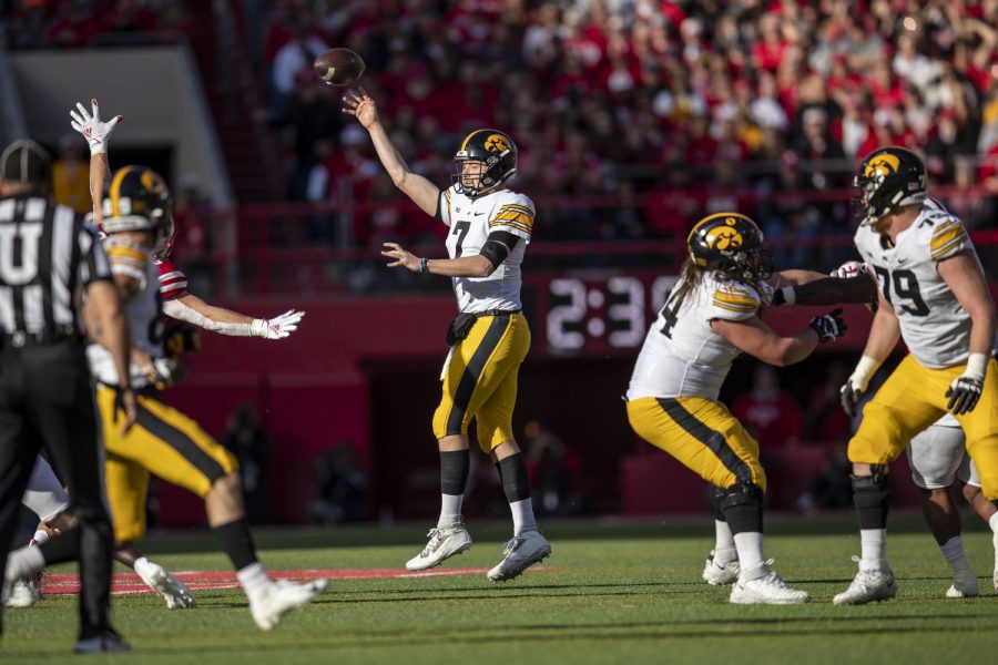 Iowa quarterback Spencer Petras throws a pass during a football game between No. 16 Iowa and Nebraska at Memorial Stadium in Lincoln, Nebraska, on Friday, Nov. 26, 2021. Petras replaced quarterback Alex Padilla at the start of third quarter. The Hawkeyes defeated the Corn Huskers 28-21. 