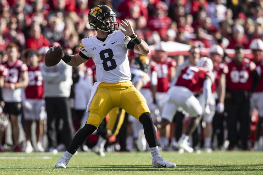 Iowa quarterback Alex Padilla looks to pass the ball during a football game between No. 16 Iowa and Nebraska at Memorial Stadium in Lincoln, Nebraska, on Friday, Nov. 26, 2021. Padilla was replaced by quarterback Spencer Petras at the start of third quarter. The Hawkeyes defeated the Corn Huskers 28-21. (Grace Smith/The Daily Iowan)