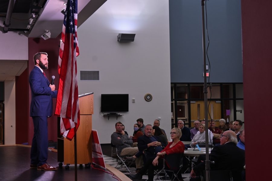 Bobby Kaufmann speaks to the audience in the Wilton Community Center on November 12, 2021. He explains how he will execute his plans on improving the state of Iowa in the upcoming year if his term. (Braden Ernst/The Daily Iowan)