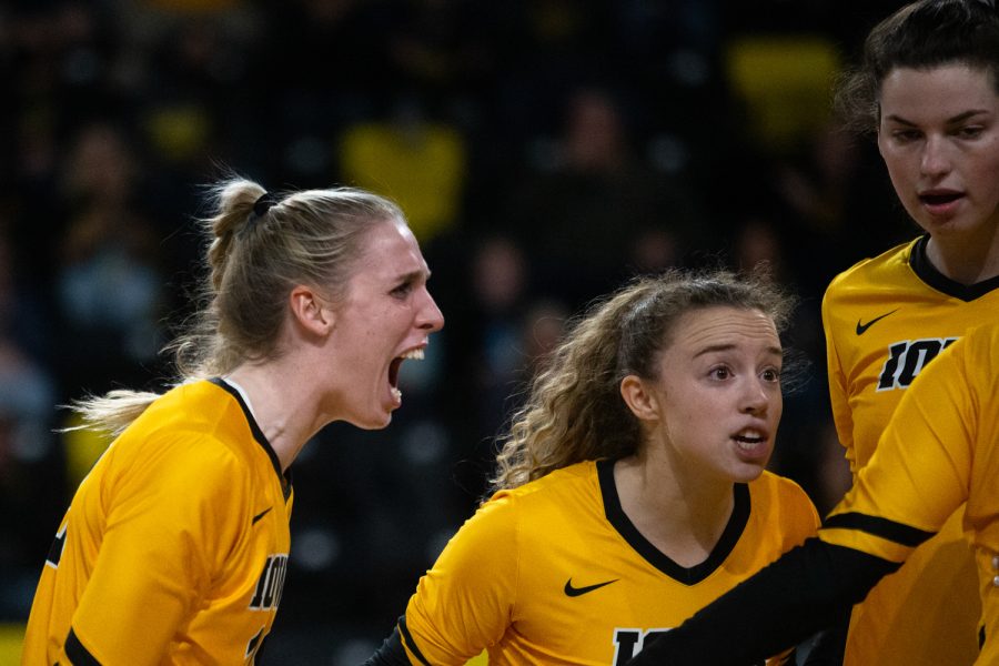 Iowa Hawkeye players celebrate after winning a volleyball game between the Iowa Hawkeyes and Indiana Hoosiers at the Xtream Arena in Coralville, Iowa on Friday, Nov. 5, 2021. The Hawkeyes beat the Hoosiers 3-1. 