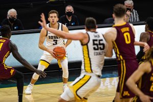 Iowa guard Jordan Bohannon looks to pass during a mens basketball game between Iowa and Minnesota at Carver-Hawkeye Arena on Sunday, Jan. 10, 2021. The Hawkeyes defeated the Golden Gophers, 86-71. 