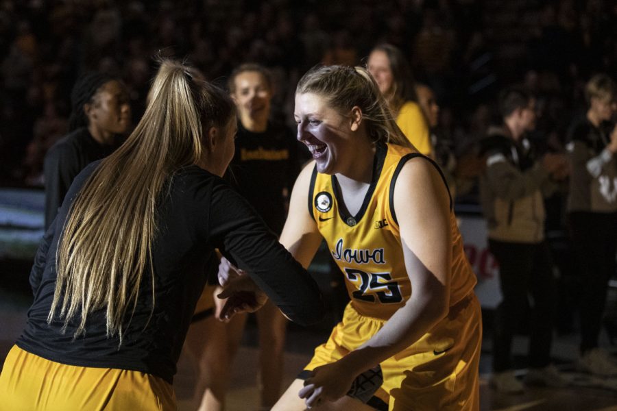 Iowa+center+Monika+Czinano+high+fives+forward+AJ+Ediger+as+Czinano%E2%80%99s+name+is+announced+before+a+women%E2%80%99s+basketball+game+between+No.+8+Iowa+and+Southern+University+at+Carver-Hawkeye+Arena+on+Wednesday%2C+Nov.+17%2C+2021.+Czinano+played+a+total+of+23+minutes+and+48+seconds.+The+Hawkeyes+defeated+the+Jaguars+87-67.
