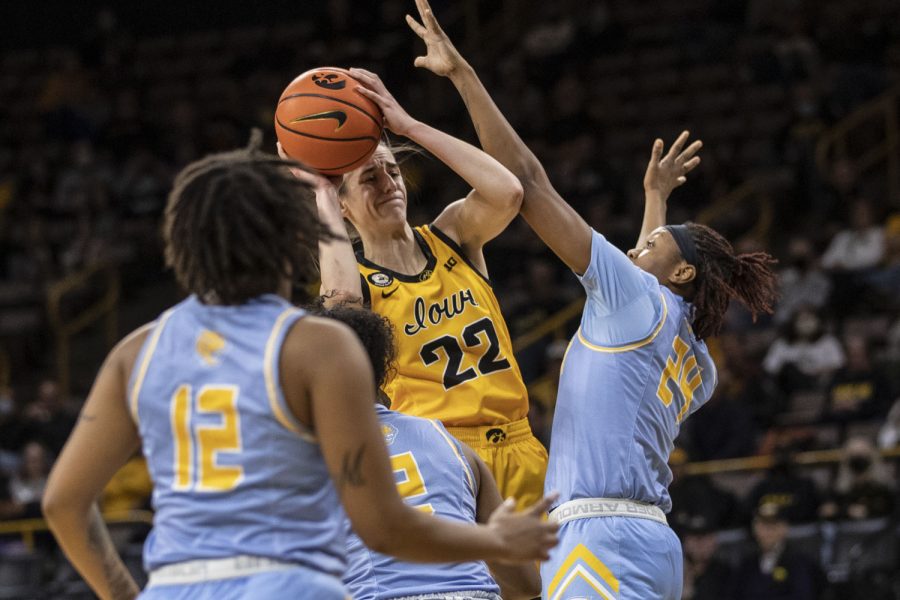 Iowa guard Caitlin Clark attempts to shoot the ball as Southern University forward Jordan Aikens fouls her during a women’s basketball game between No. 8 Iowa and Southern University at Carver-Hawkeye Arena on Wednesday, Nov. 17, 2021. Clark shot 2-9 from the field. The Hawkeyes defeated the Jaguars 87-67.