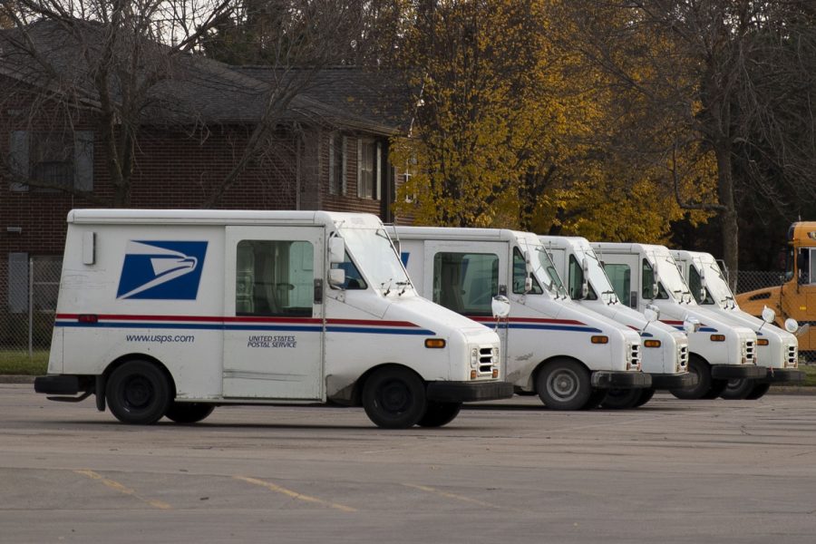 Mail trucks shown outside of the United States Postal Office in Iowa City on Tuesday, Nov. 9, 2021. 
