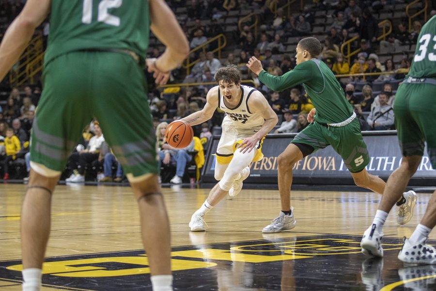 Iowa forward Patrick McCaffery drives to the basket during a men’s basketball game between Iowa and Slippery Rock at Carver-Hawkeye Arena in Iowa City on Friday, Nov. 5, 2021. The Hawkeyes beat The Pride of the Rock 99-47.