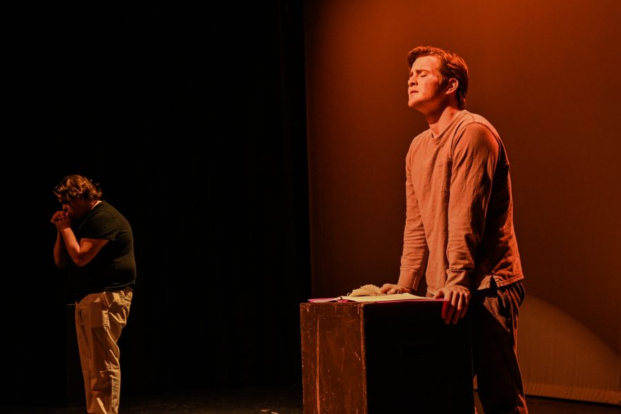 John Orlet (right) and Ben Heirigs (left) act out an interlude in their play “Sawdust” on November 17th, 2021. The play is written by Val Timke and co-directed by Katie Redden and Kiley Rowe will premiere Friday, November 19th, at 8:00PM. 