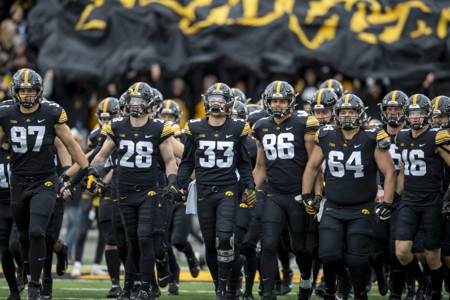 Iowa+enters+the+field+during+a+football+game+between+No.+19+Iowa+and+Minnesota+at+Kinnick+Stadium+in+Iowa+City+on+Saturday%2C+Nov.+13%2C+2021.+The+Hawkeyes+defeated+the+Gophers+27-22.