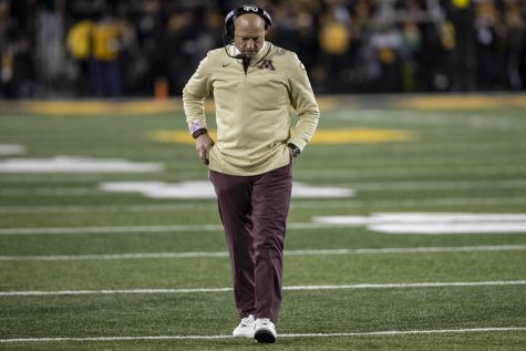 Minnesota head coach P. J. Fleck walks down the sidelines during a football game between No. 19 Iowa and Minnesota at Kinnick Stadium on Saturday, Nov. 13, 2021. The Hawkeyes defeated Gophers 27-22.