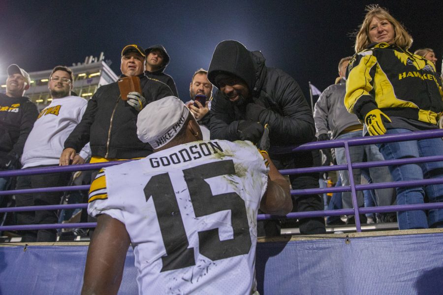 Iowa running back Tyler Goodson celebrates with his father after a football game between No. 19 Iowa and Northwestern at Ryan Field in Evanston, Illinois, on Saturday, Nov. 6, 2021. Goodson’s longest carry went for 41 yards.The Hawkeyes defeated the Wildcats 17-12.