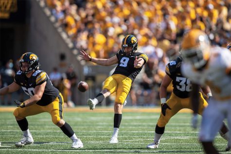 Iowa punter Tory Taylor kicks the ball during a football game between No. 19 Iowa and Kent State at Kinnick Stadium on Saturday, Sept. 18, 2021.